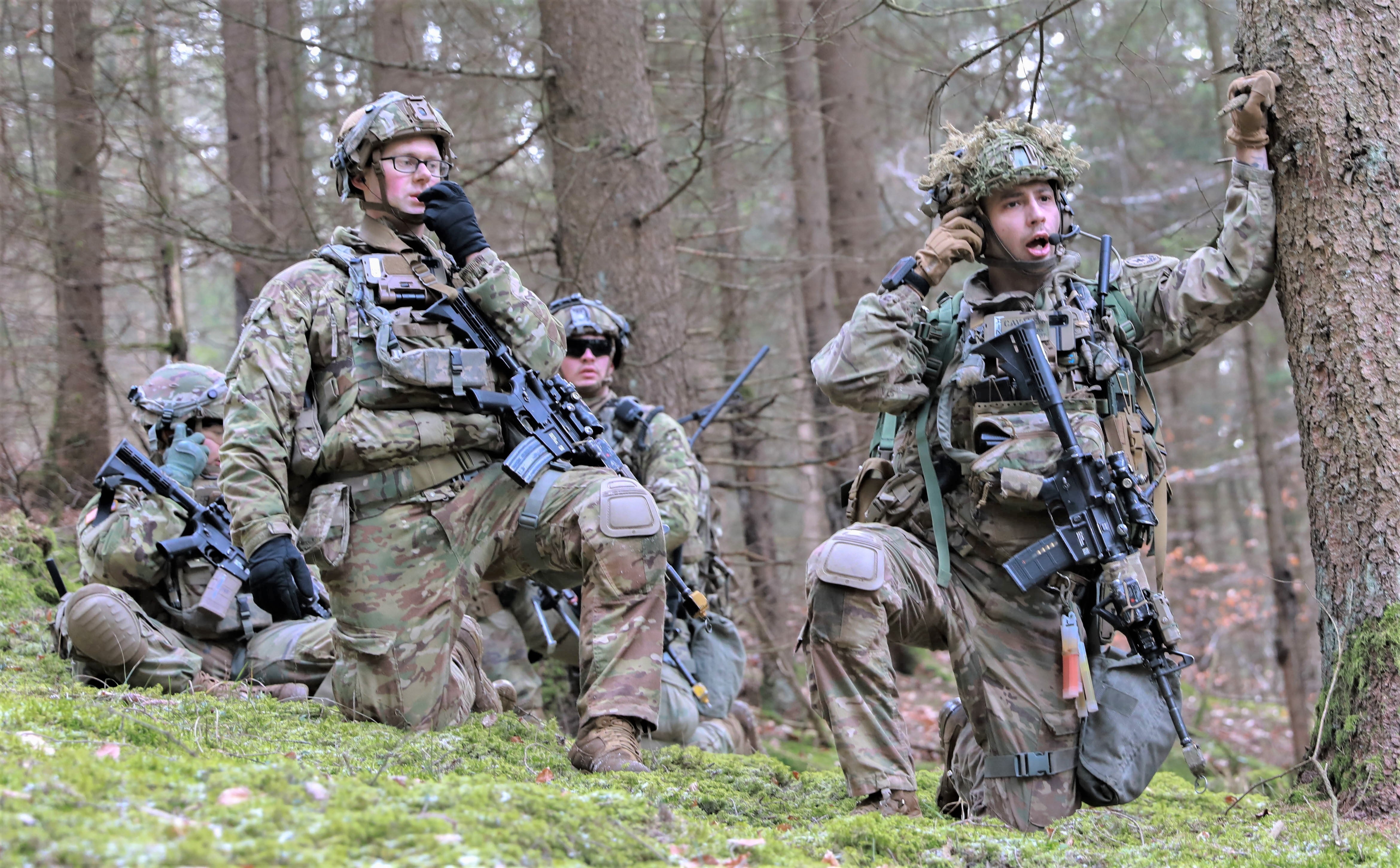 U.S. Army Soldiers with the 2nd Cavalry Regiment are pictured during Dragoon Ready 2023. They are using integrated tactical network capabilities, which include radios.