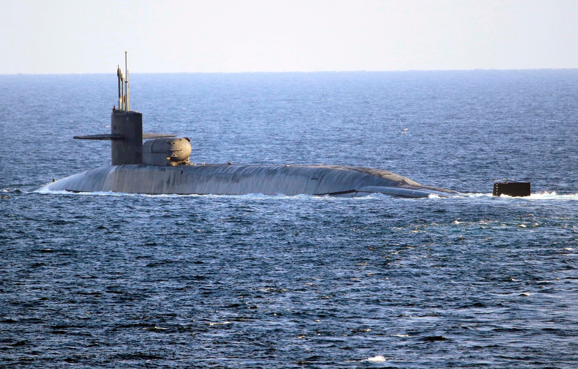 The guided-missile submarine USS Georgia transits the Strait of Hormuz on Monday, Dec. 21, 2020.