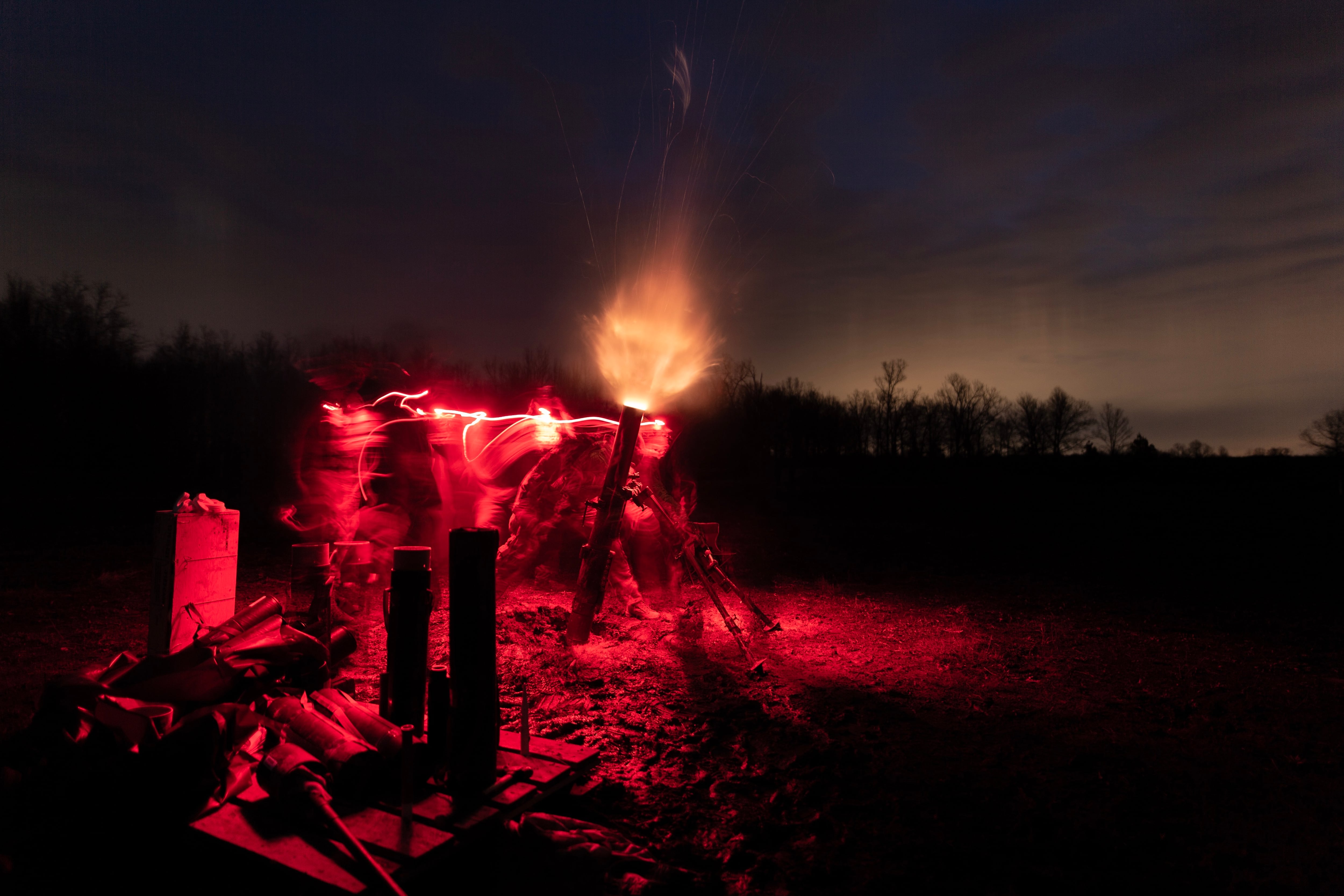 U.S. Army soldiers  fire the M121 mortar system during a live-fire exercise at Fort Campbell, Kentucky, in January 2018.