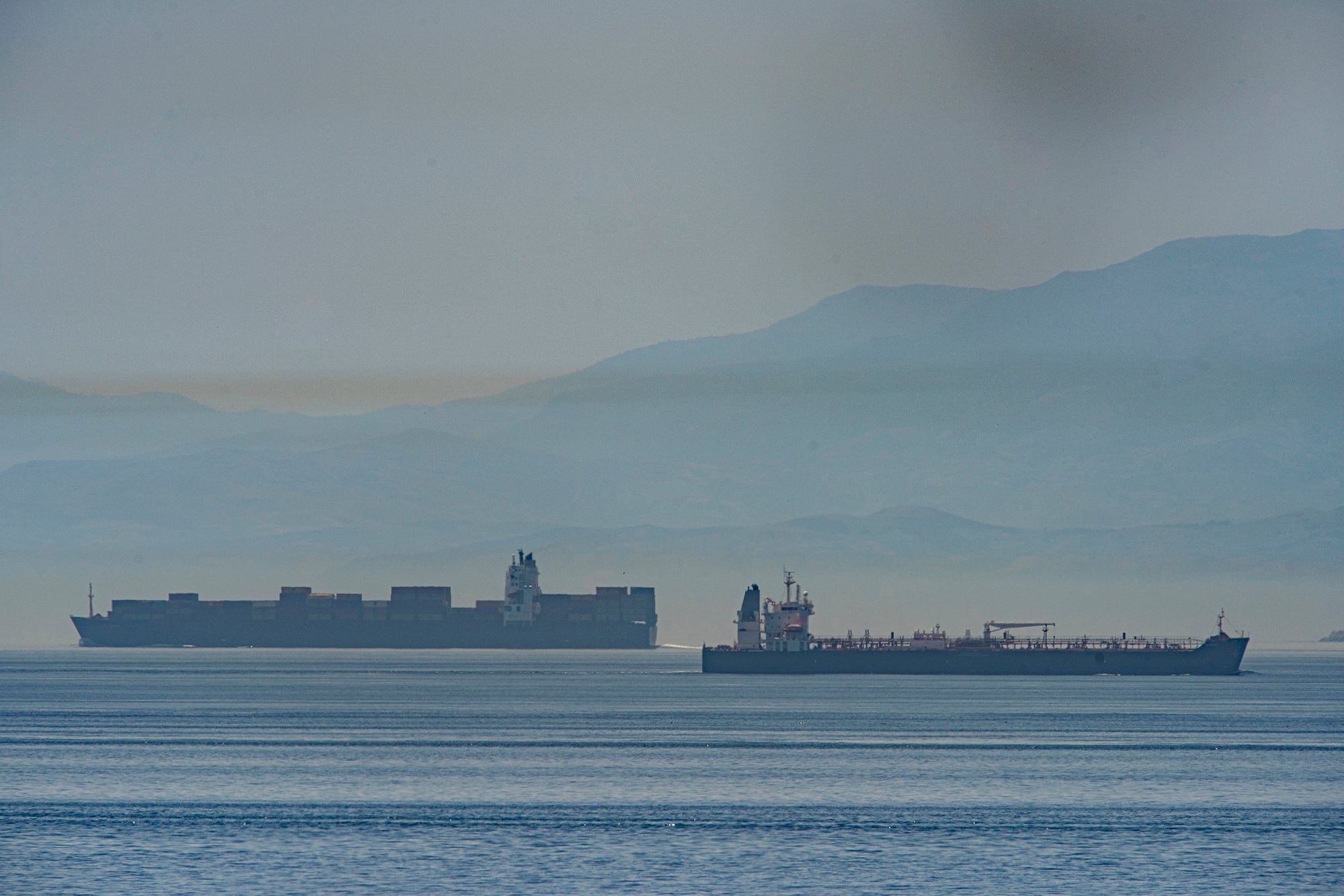 A view of the vessel the Clavel, right, sailing on international waters crossing the Gibraltar stretch on Wednesday, May 20, 2020.