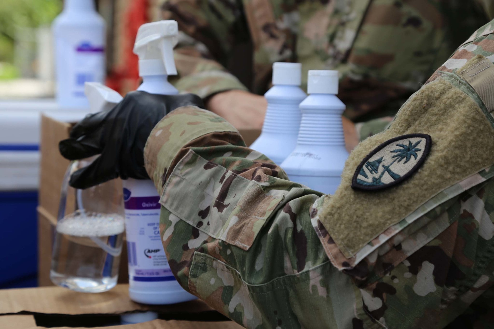 Guam National Guard service members prepare to disinfect Guam Department of Labor offices in Hagatna May 12, 2020.