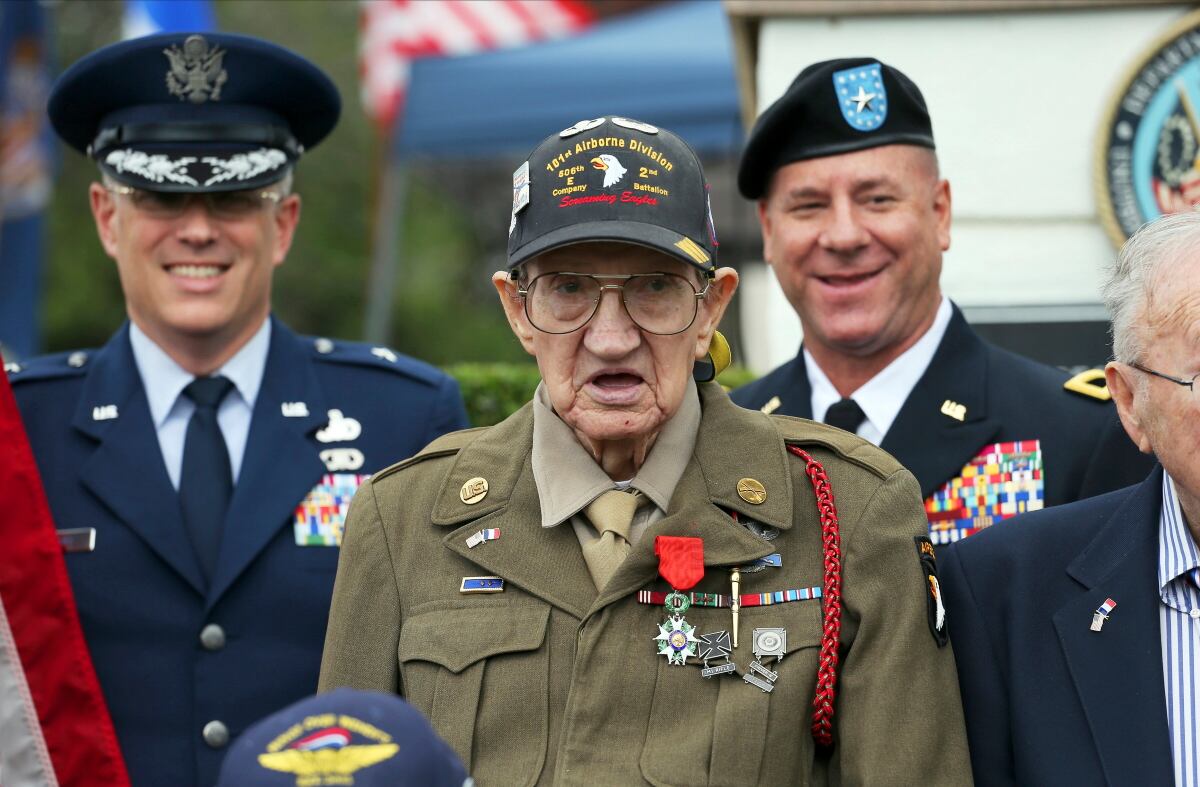 In this Sept. 19, 2017, file photo, U.S. Army Pvt. Henry L. Ochsner is awarded the National Order of the Legion of Honor,